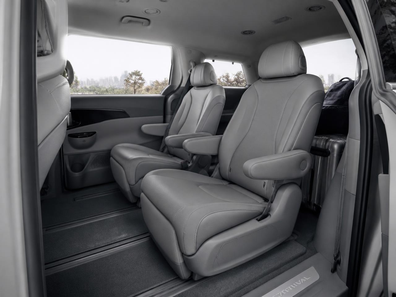 Kia Carnival interior with captain seats and luggage space